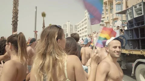 People with  dancing on the beach during Annual Pride Parade, Tel Aviv Beach Video stock 67417870