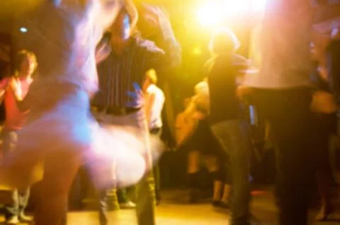 People dancing blur background Stock Photos