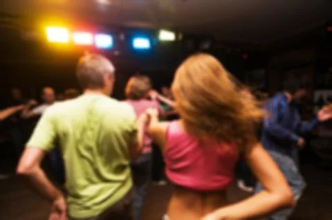 People dancing blur background Stock Photos