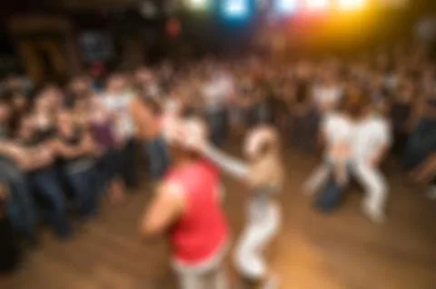 People dancing blur background Stock-Fotos