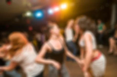 People dancing blur background Stock Photos