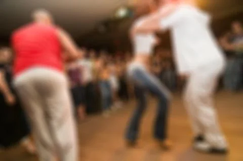 People dancing blur background Stock Photos