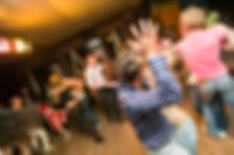People dancing blur background Stock Photos