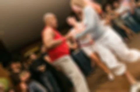 People dancing blur background Stock Photos