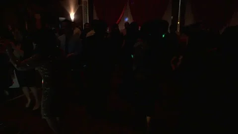 People dancing cha-cha in dark with disco lights (variant). Stock-Footage 149076783