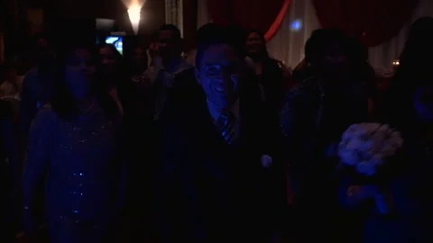 People dancing cha-cha in dark with disco lights Video stock 149076897