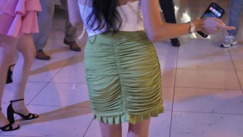 People dancing on a crowded dance floor at a party close up Stock Footage 345279641