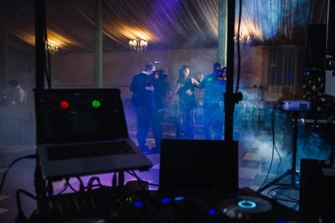 People dancing in the dark in a restaurant Stock Photos