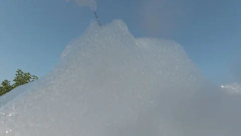 People dancing in the foam close-up. Foam party on a sunny day, wet hands in the Stock Footage 115028205