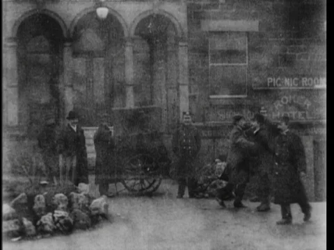 People dancing in front of a build as seen from a tram, Sunderland UK 1904 Video stock 136685184