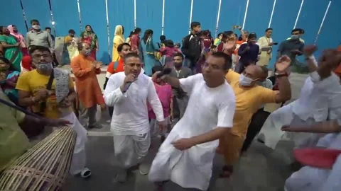 People dancing on Hare Krishna tunes Stock Footage 152585345