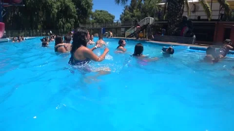 People dancing inside pool Stock Footage 156829767