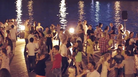 People dancing at night at quay Video stock 40322456