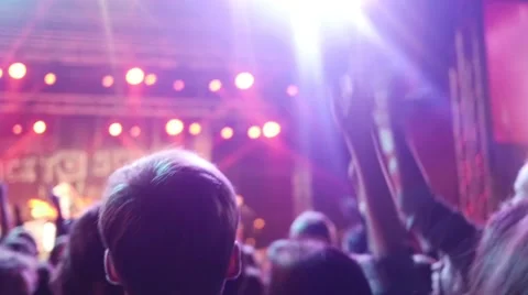 People dancing at open air rock festival Stock Footage 44207438