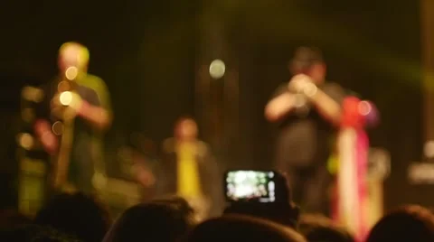 People dancing at open air rock festival Stock Footage 44215944