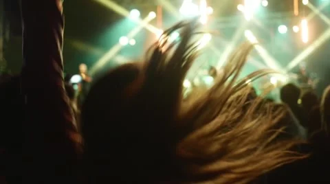 People dancing at open air rock festival Stock Footage 44216795
