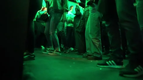 People dancing on a packed dancefloor during a high energy nightlife party Stock Footage 331565983