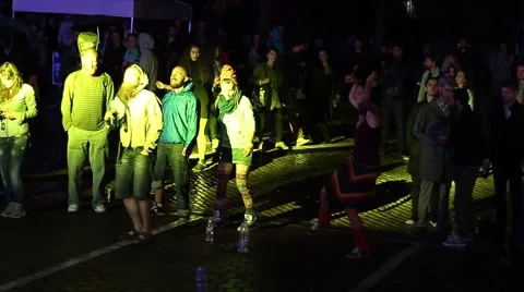 People dancing in the rain during a concert reggae feel freedom Stock Footage 54582889