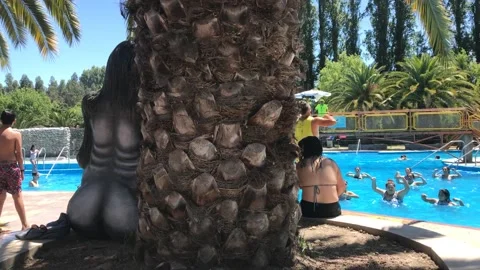 People dancing reggaeton in the pool Stock Footage 156830357