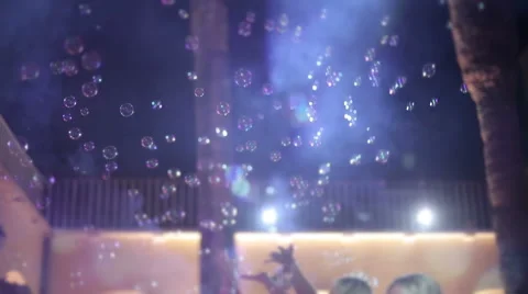 People dancing in soap bubbles Stock Footage 44569665