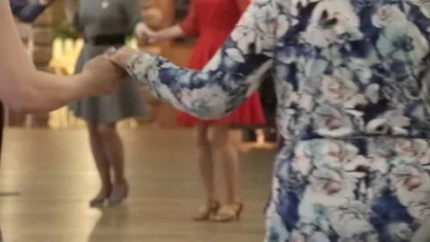 People dancing together at a dancing class party, learning to dance folk and Stock Footage 102343367