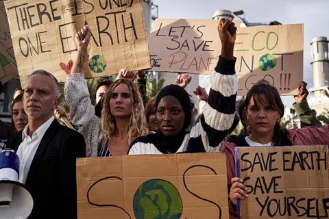 People demonstrating for problems in ecology, environment, and climate change. Stock Photos