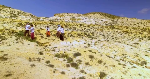People in desert Stock Footage 89577191