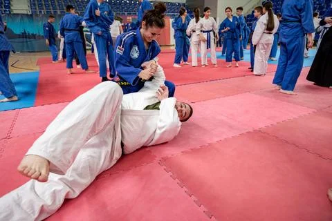 People of different ages practice real aikido technique moves martial arts .. Stock Photos