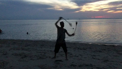 People from different countries dance at sunrise on Haad Rin beach Stockbeeldmateriaal 107348864