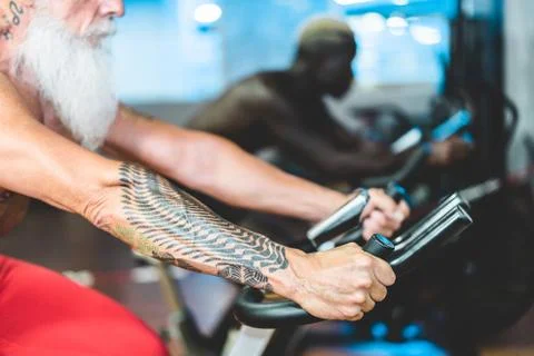 People from different generation and ethnicities doing workout session on car Stock Photos