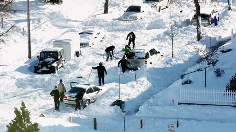 People Digging Out from Snow Stock Footage