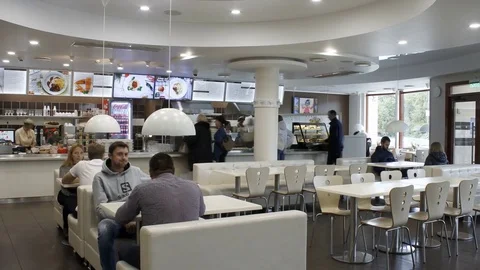 People dining in cafeteria Stock Footage