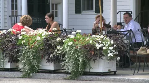 People dining on a patio (1 of 2) Stock Footage 10687074