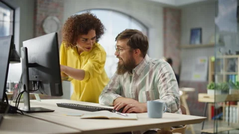People Discussing Work Using Computer in... | Stock Video | Pond5