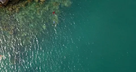 People diving and snorkeling in Adamant sea, Myanmar islands, cockburn Stock Footage 108469953