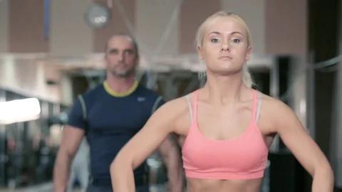 People do with a barbell in the gym. Stock Footage 80438084