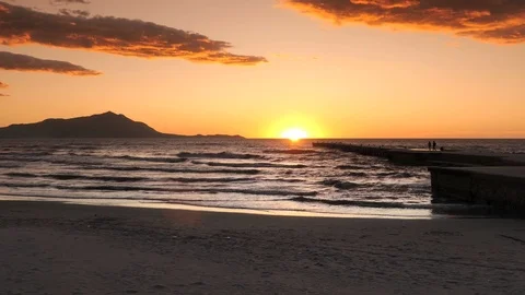 People on the dock at sunset Video stock 96579534