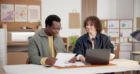People, document and laptop in office for ecommerce, logistics and sales report Stock Footage 345701747