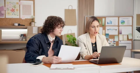 People, document and laptop at startup for logistics, ecommcerce and sales Stock Footage 345703171