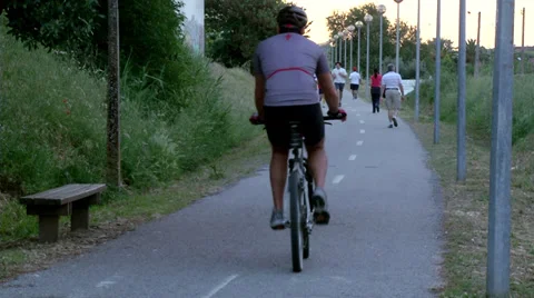 People doing exercise outdoors Stockbeeldmateriaal 32653168