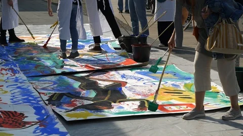 People draw with large brushes Stock-Footage 126370003