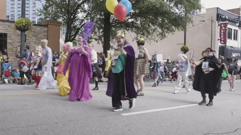People dressed as periodic table elements walk in Atlanta parade Stock Footage 296137938
