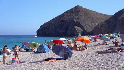 People dressing on windy Playa de los Muertos beach, static 스톡 동영상 280741050