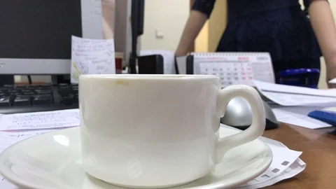 People drink coffee in the office Stock Footage 106575321