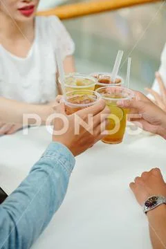 People drinking iced tea ~ Premium Stock Photo #144528484