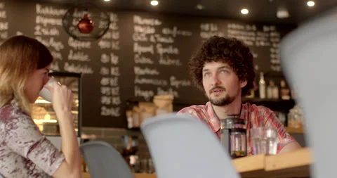 People drinking tea coffee talking offline interactions. People connection life Stock Footage 248864571