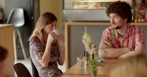 People drinking tea talking to each other offline. Real life people connection Stock Footage 248865703