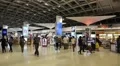 People in duty free area inside Bangkok international airport in Thailand HD Footage