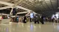 People in duty free area inside Bangkok international airport in Thailand HD Footage
