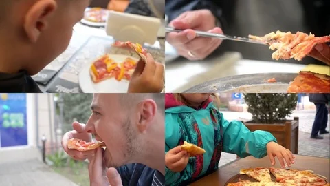 People eat a Pizza while sitting on a cozy Cafe Table Stock Footage 79713371